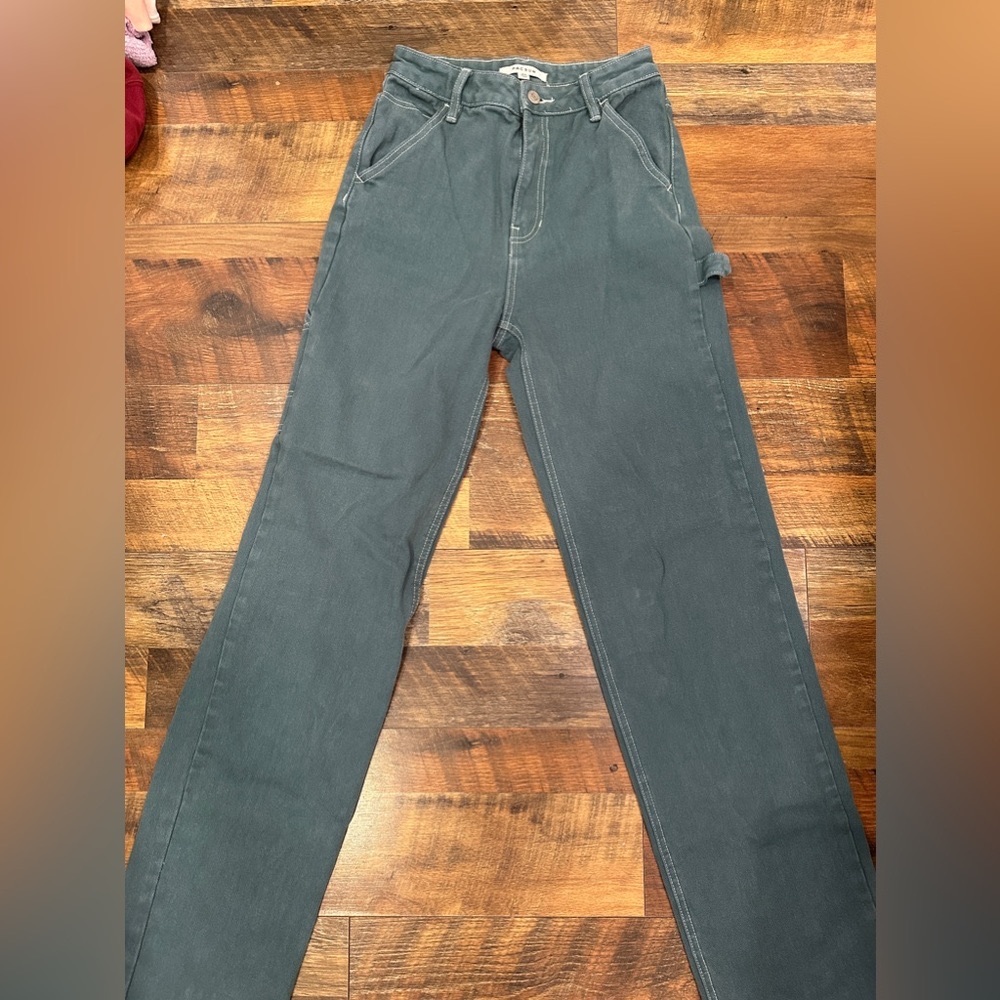 pacsun size 24 or 0. a kind of teal green color.